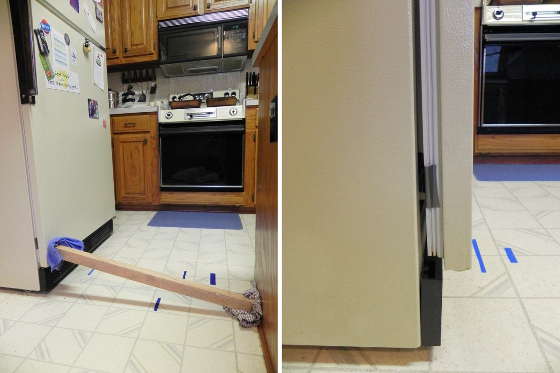 Keeping the door closed with a board! You can see the gap without it, and some of the duct tape.