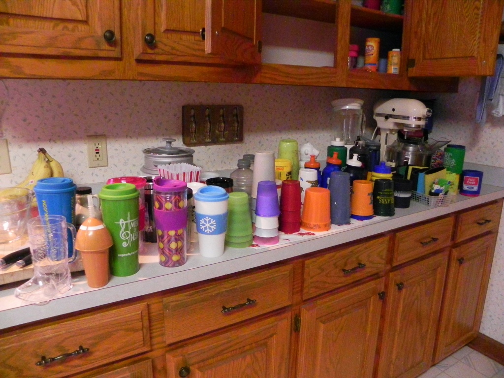 Yes, it's time to go through the cabinets and toss out excess cups!