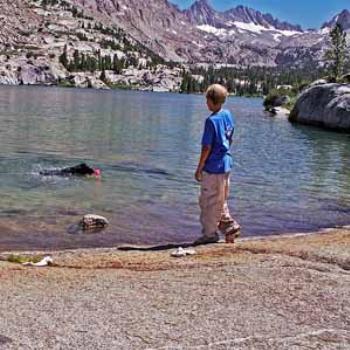 <b>Our dog, Calvin, loves to swim in mountain lakes. Too cold for me!</b>