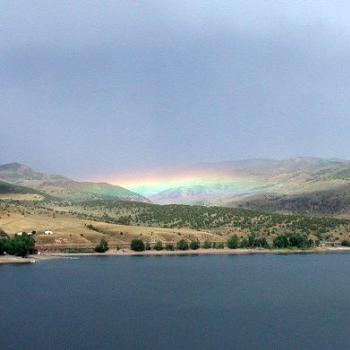 <b>Rainbow in Distant Valley Across Utah Reservoir</b>