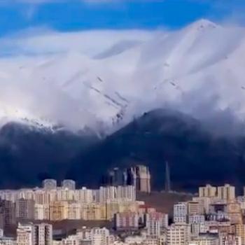<b>Tehran w snowy mtns, clouds</b>