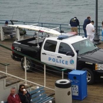 <b>Santa Monica Pier. A cop car with a surfboard on the back. Doug / Adelaide</b>