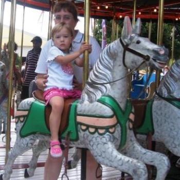<b>On the Carosel Horse (real one is better!)</b>