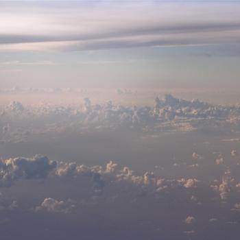 <b>Between clouds, somewhere over the Pacific, July 2010 - Bev,AB</b> <b>Between clouds, somewhere over the Pacific, July 2010 - Bev,AB</b>